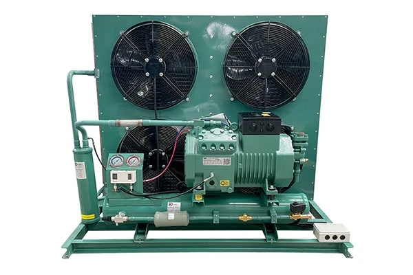 Semi-hermetic piston compressor unit